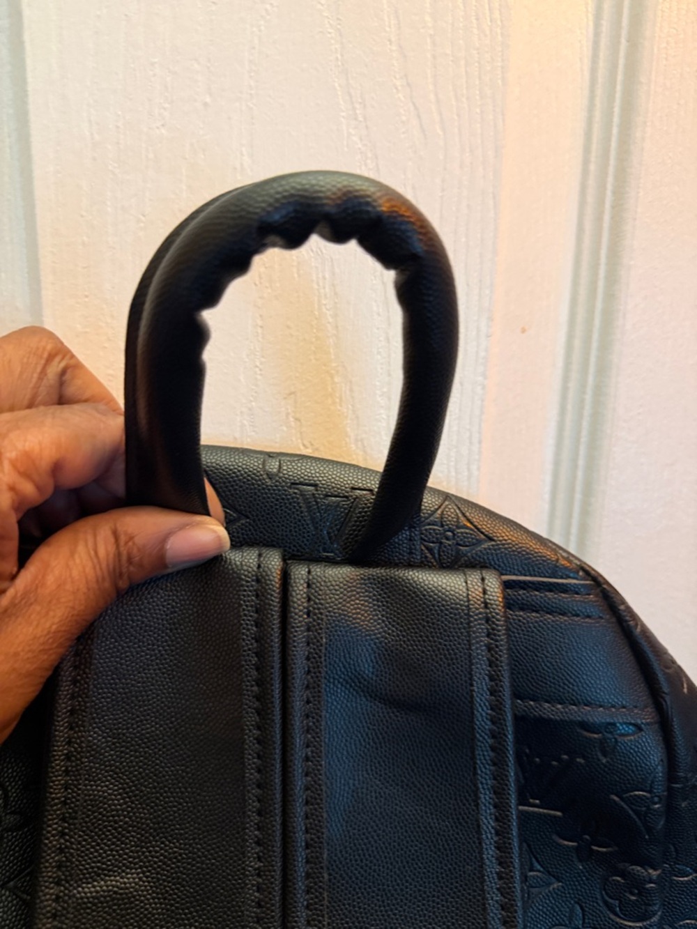 Embossed Monogram Black Backpack - Picture 10 of 11